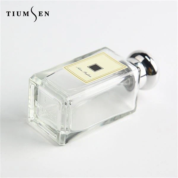 women's perfume in purple bottle